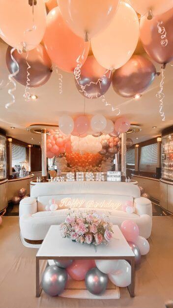 Birthday party decorations setup on luxury yacht.