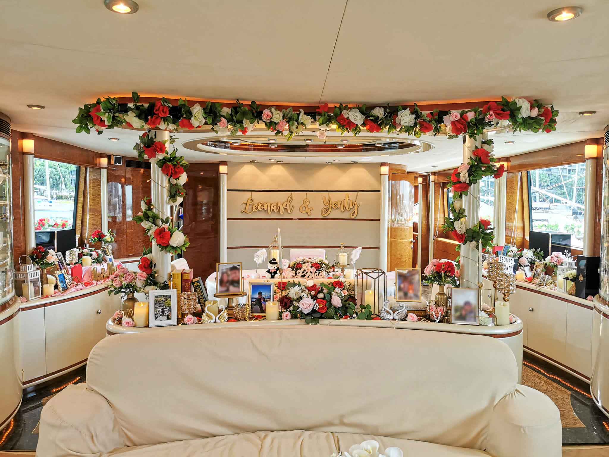 Romantic yacht wedding decor with fresh flowers