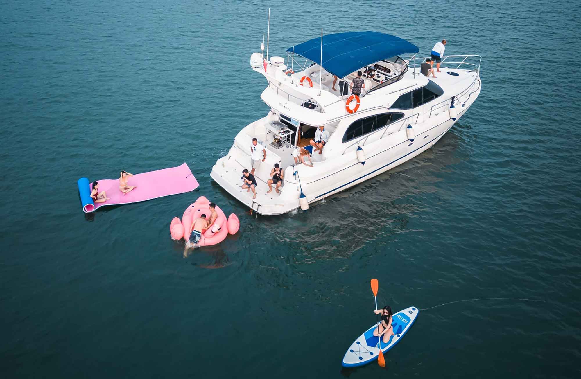 water activities with giant slide, giant float and water toys on yacht charters in Singapore
