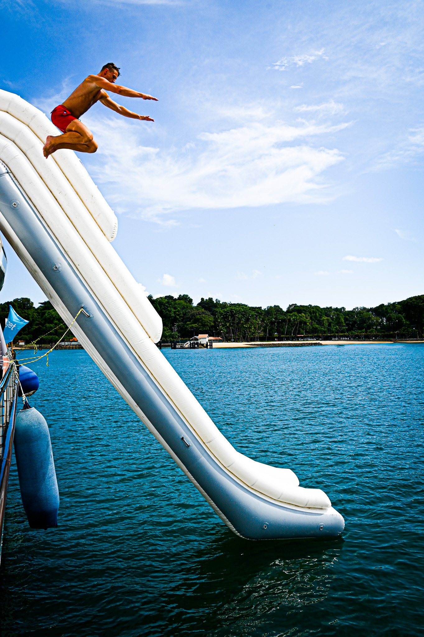 water activities with giant slide, giant float and water toys on yacht charters in Singapore