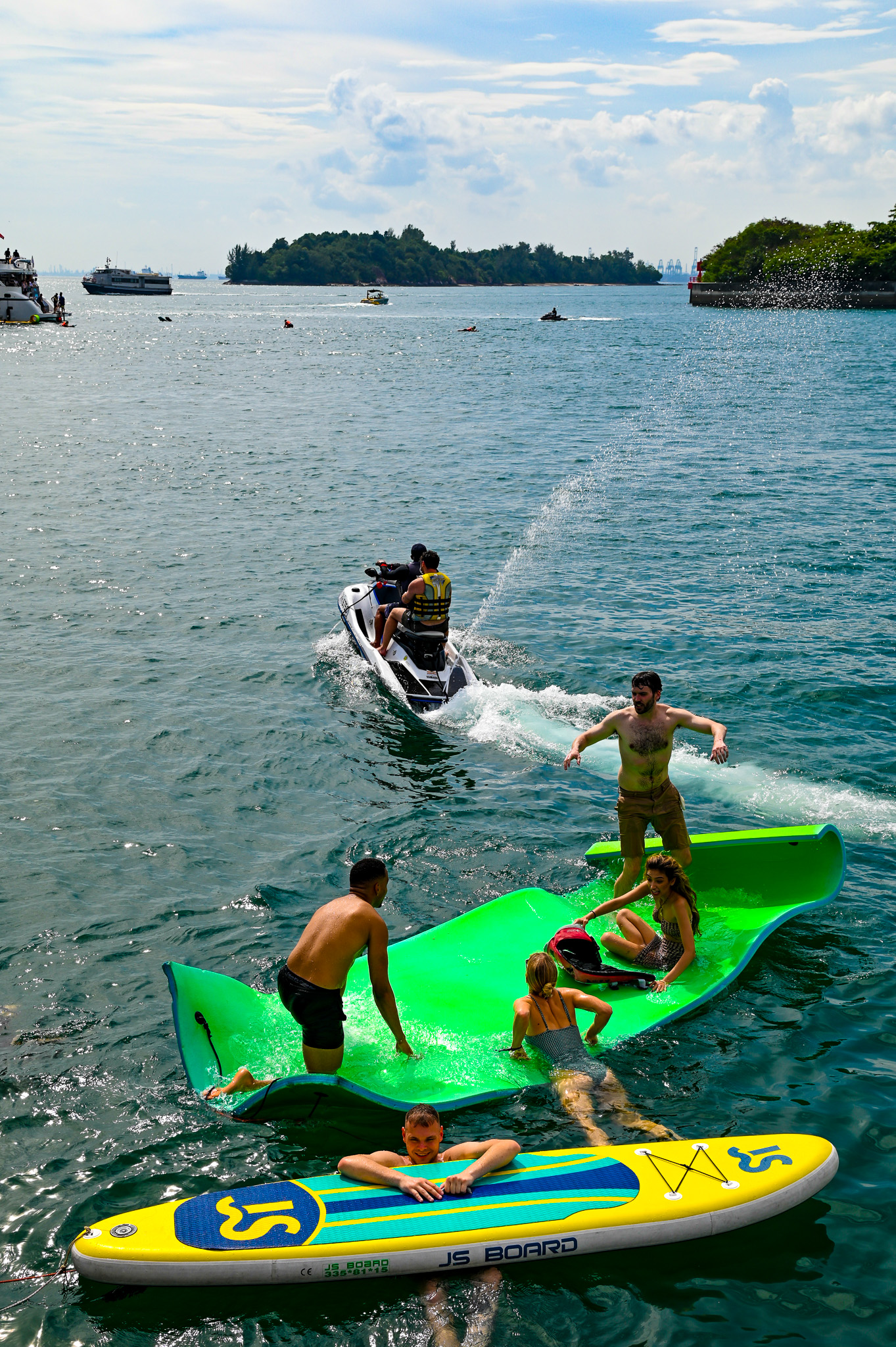 water activities with giant slide, giant float and water toys on yacht charters in Singapore