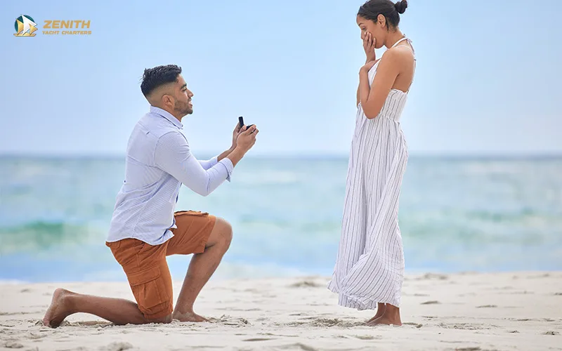A-man-proposing-to-a-woman-on-a-beach