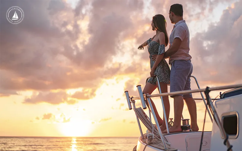 Beautiful-couple-looking-at-the-sunset-from-a-yacht