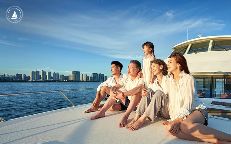 Family-of-five-looking-out-the-horizon-on-a-private-yacht-1