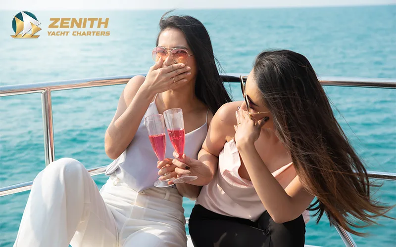 Two_beautiful_female_friends_on_luxury_yacht