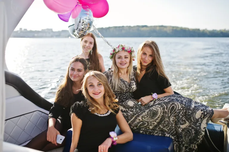 Girls having fun at yacht on her party.