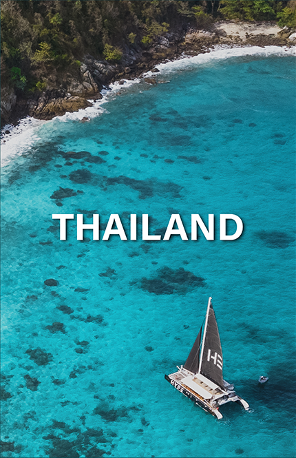 Sailboat in a clear blue bay at Phi Phi Island, Thailand