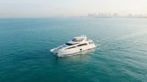 Private luxury yacht cruising on calm open water near Singapore